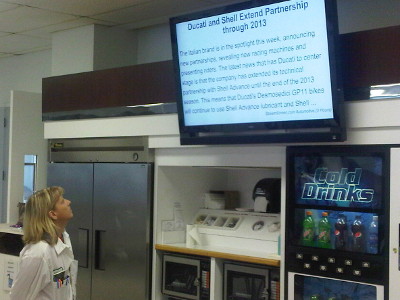 employee communication screen placed strategically over vending machine