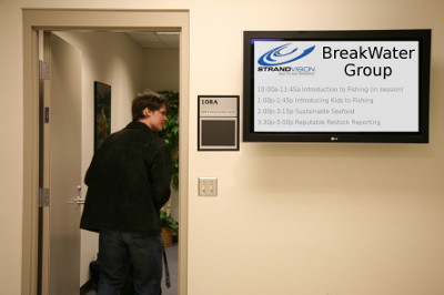 digital signage screen outside of meeting room