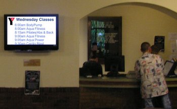 YMCA renovated lobby lists schedules and events